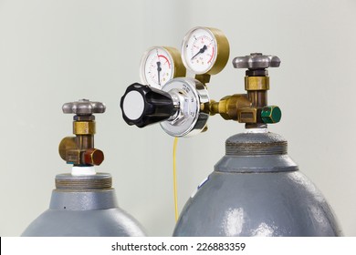 Close Up Gauges And Valve On Old Nitrogen Gas Cylinder In Laboratory