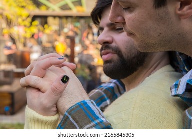 Close up of gay couple holding hands with love outdoors. LGBTQ, diversity, inclusive concept. Copy space.

 - Powered by Shutterstock