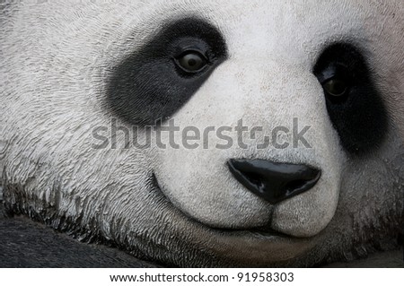 close up of a giant panda statue