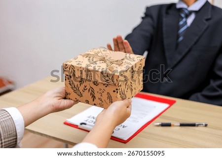 Close Up Of Gift Being Rejected Hands Offer Present Met With 