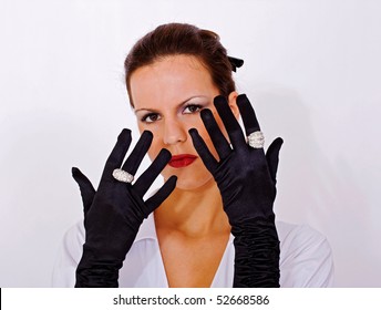 Close Up Of Girl With Black Satin Gloves