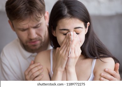 Close Up Girl Hold Handkerchief Crying Guy Calms Comforts Her, Apologizing After Quarrel, Interruption Unwanted Pregnancy, Miscarriage. Friend Hug Support After Disagreement With Loved One, Break Up