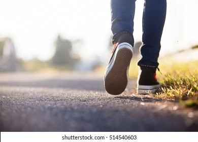 Close up of girl shoes walking - Shutterstock ID 514540603