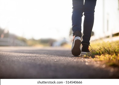 Close up of girl shoes walking - Shutterstock ID 514540666