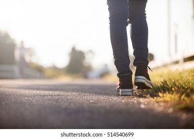 Close up of girl shoes walking - Shutterstock ID 514540699