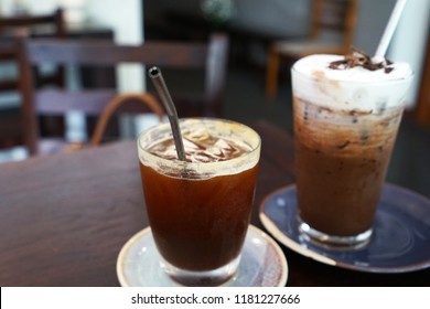 Close Up Glass Of Iced Black Coffee With Stainless Steel Straw