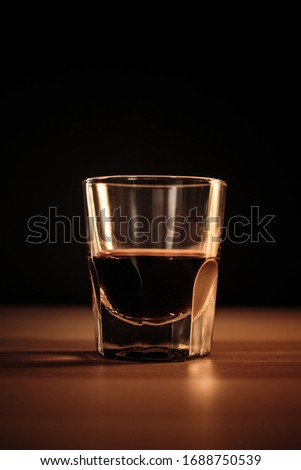 Similar – Image, Stock Photo a small glass of coffee and a white flower on a walnut table