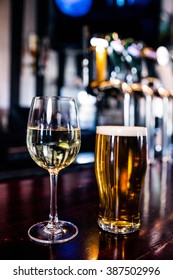 Close Up Of A Glass Of Wine And A Beer In A Bar