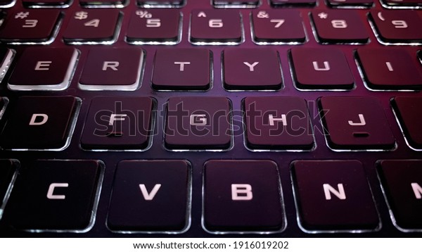 laptop with glowing keyboard