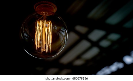 Close up glowing light bulb.