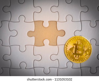 Close up gold bitcoin and Final piece of jigsaw puzzle