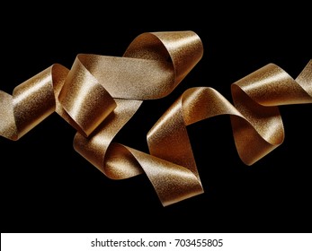 Close Up Of Gold Bronze Metallic Ribbon Isolated On Black Background