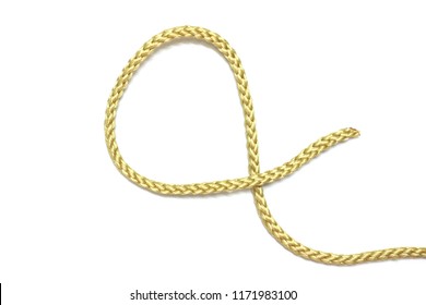 Close Up Of Gold Rope On White Background