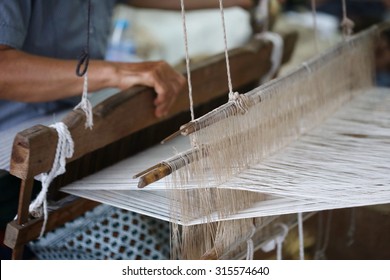 Close Up Of Gold Silk Weaving On Loom, Cotton On The Manual Wood Loom In Asian Traditional Culture And Woman Hand Weave Lifestyle