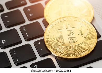 Close Up Golden Bitcoins Mockup On Tablet  Background. Investment Success Crypto Currency Concept.