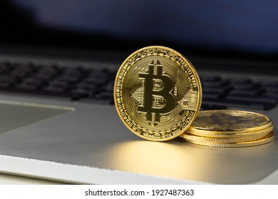 Close up golden Bitcoins mockup on tablet  background. Investment success Crypto currency Concept.