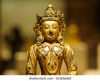 Close Up Of Golden Buddhist Statue