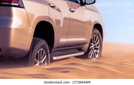 Close Up Of A Golden Car Stuck In The Sand In The Namib Desert. Africa