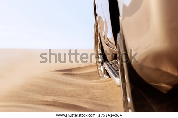 Close up of a golden car\
stuck in the sand in the Namib desert. 07.04.2021. Africa. Namibia\
