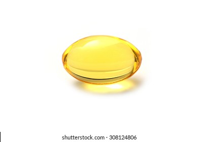 Close Up Golden Color Oil Supplements In Soft Gel Capsule, Healthy Product Concept