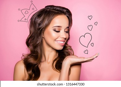 Close up of gorgeous charming brown wavy-haired lady ideal face presenting new product. Sales marketing discounts ad pampering lips dermatology healthcare concept isolated over pink pastel background - Powered by Shutterstock