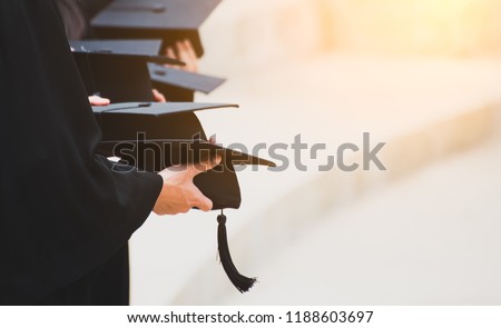 Close up Graduate holding a hat. Concept sucess education in University with copy space. Education graduation in university theme concept.