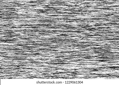 Close up gray cotton fabric texture background.  
Black and white textured knit fashion fabric background. 
Selective focus.
top view. - Shutterstock ID 1229061304