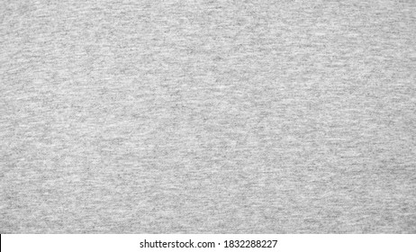 Close up gray cotton heather texture background.  
				Black and white textured knit fabric pattern seamless.
				Selective focus.
				top view.