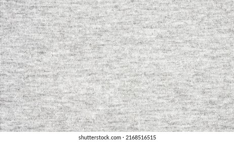 Close up gray cotton heather texture background.  
Black and white texture knit fabric pattern seamless.
Selective focus.
top view. - Shutterstock ID 2168516515