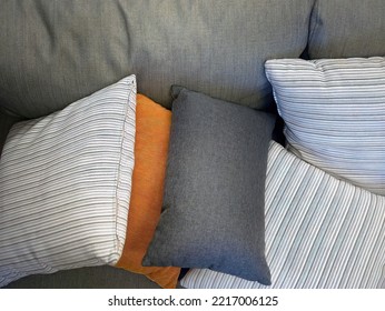 Close up gray fabric couch Sofa with colorful backrest pillows, comfortable, relax, rest, cozy, homy style, wallpaper