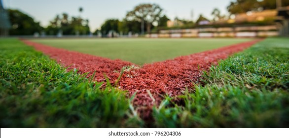 Close up of green bowls lawn during the day.