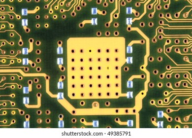 A close up of a green computer circuit.