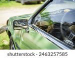 Close up of a green vintage car