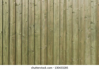 Close Up Of Green Wooden Fencing.