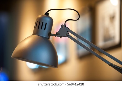 Close up of grey table lamp with interior background.Selective focus