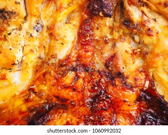 Close Up Grilled Chicken Skin Background Texture. Roast Chicken.