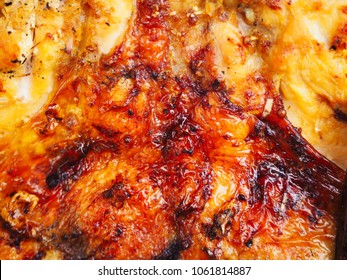 Close Up Grilled Chicken Skin Background Texture. Roast Chicken.