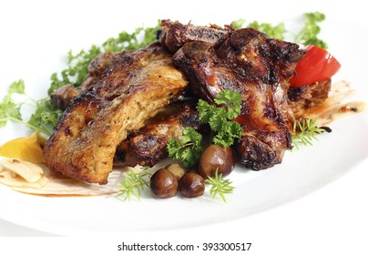 Close up grilled pork ribs, with mushrooms