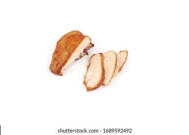 A Close Up Of Grilled, Sliced Chicken Breast Isolated On White Background .