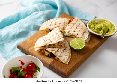 Close Up Of Grilled Tortilla With Meat Salsa Guacamole