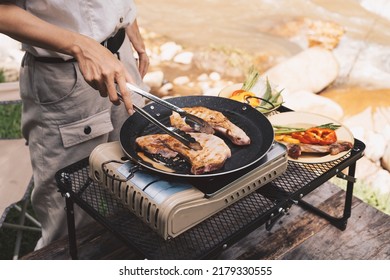 Close up grilling barbecue in the campground at summer camp travel, Skewers of pork and beef fillet on barbecue party in camping, Summer Camp Travel one activity for relaxing.. - Powered by Shutterstock