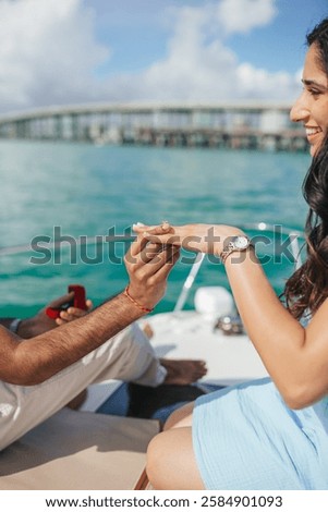 Close up Groom Putting the Wedding Ring on bride