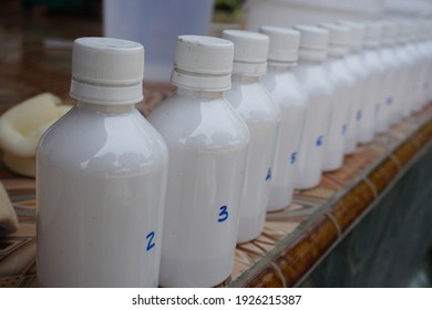 Close up of group of white bottle with ordered number on the label. Suitable for research concept.