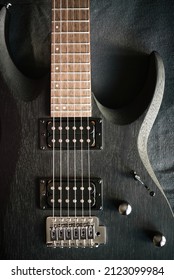 close up of a guitar, blurred focus	