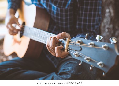 Close Up Of Guitar Player