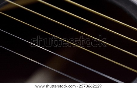 Close up of guitar with strings