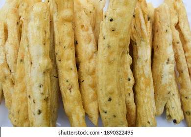 Close up of Gujarat famous snack cuisine item snacks breakfast. made with gramflour and fried. top view. tasty indian food teatime snacks eatedn during festival, holidays, sunday along with jalebi