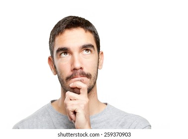 Close up of a guy wondering - Shutterstock ID 259370903