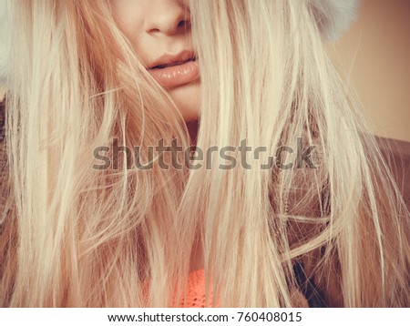 Similar – Profile portrait of a blonde and sad woman