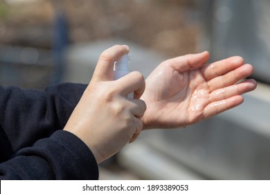 Close Up  Hand With Alcohol Spray